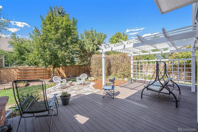 wooden deck with a pergola