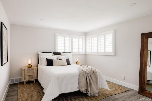 3540 Everett St, Wheat Ridge, CO 80033 - bedroom featuring wood finished floors and baseboards