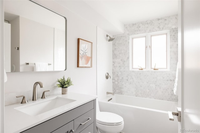 3540 Everett St, Wheat Ridge, CO 80033 - bathroom with toilet, vanity, and bathing tub / shower combination