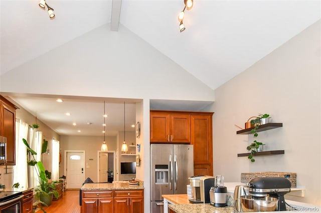 kitchen featuring brown cabinetry, appliances with stainless steel finishes, light wood-style floors, open shelves, and beam ceiling