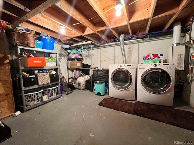 unfinished below grade area with washer and clothes dryer