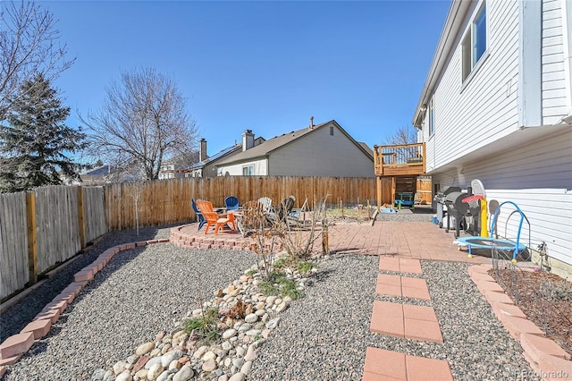 view of yard featuring a patio area and a fenced backyard