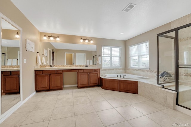 full bathroom with visible vents, tile patterned flooring, a bath, and a shower stall