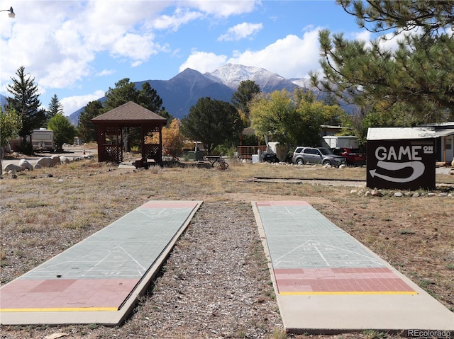 view of community with a gazebo and a mountain view