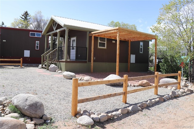 view of property exterior featuring a porch