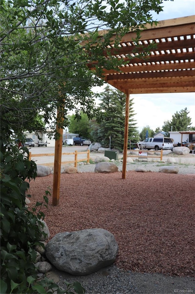 view of yard with a pergola