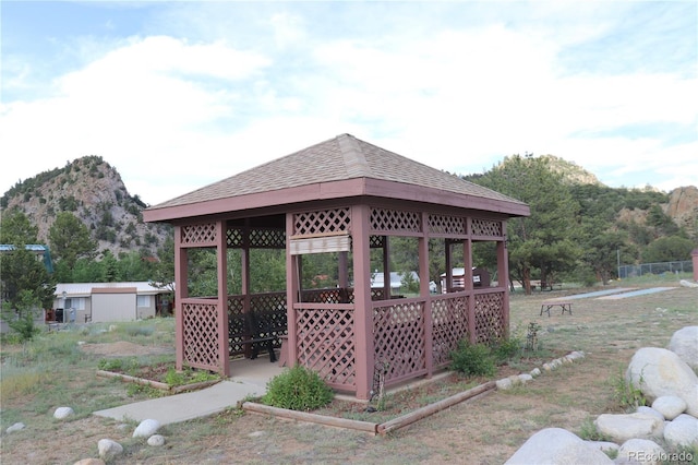 exterior space featuring a gazebo and a mountain view