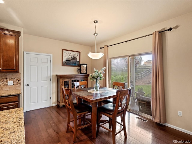 11945 S Saunter Ln, Parker, CO 80138 - dining space with dark wood-style flooring