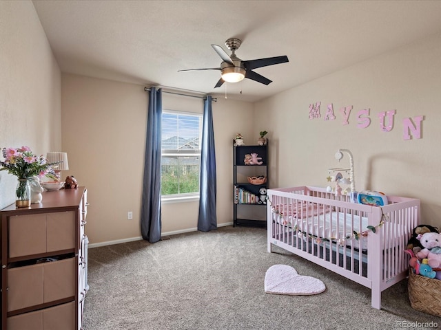 11945 S Saunter Ln, Parker, CO 80138 - bedroom with carpet flooring, a crib, and ceiling fan