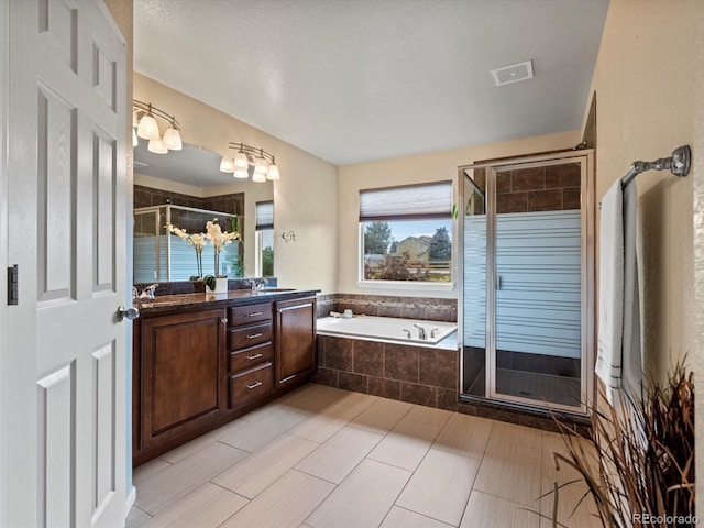 11945 S Saunter Ln, Parker, CO 80138 - full bath featuring double vanity, a stall shower, and a garden tub