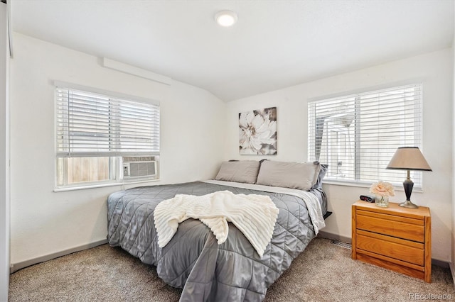 carpeted bedroom featuring lofted ceiling, cooling unit, and baseboards