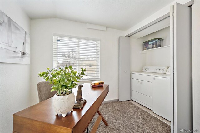 office area with washer / clothes dryer and light carpet