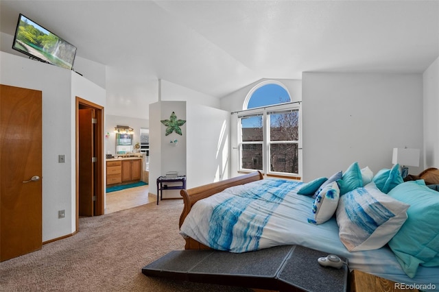 8441 Urban Ct, Arvada, CO 80005 - carpeted bedroom with connected bathroom, baseboards, and vaulted ceiling