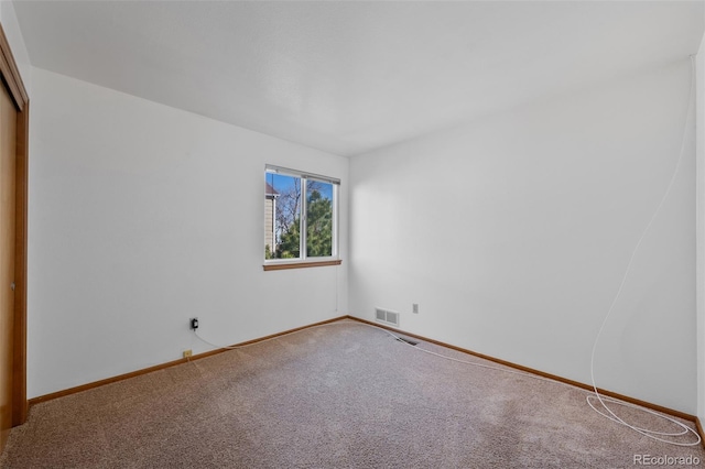 8441 Urban Ct, Arvada, CO 80005 - empty room featuring baseboards, visible vents, and carpet floors