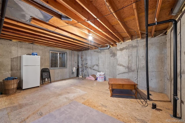 8441 Urban Ct, Arvada, CO 80005 - unfinished basement featuring freestanding refrigerator