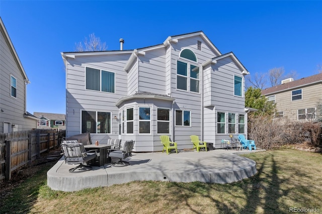 8441 Urban Ct, Arvada, CO 80005 - back of house with a yard, a patio area, and fence