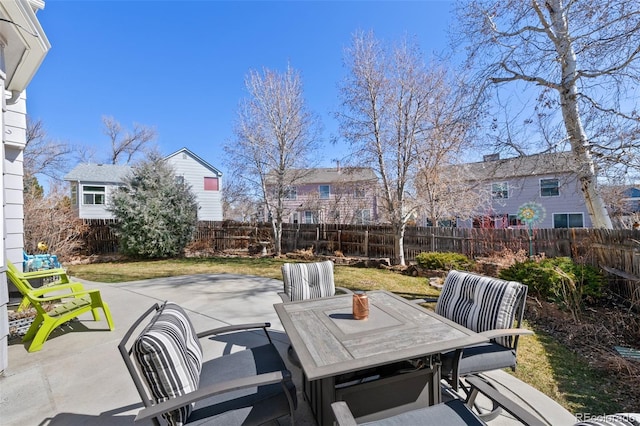 8441 Urban Ct, Arvada, CO 80005 - view of patio / terrace with outdoor dining area and a fenced backyard