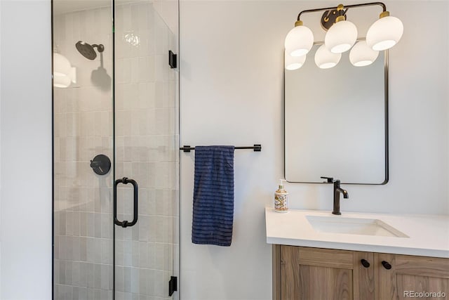 full bath featuring vanity and a stall shower