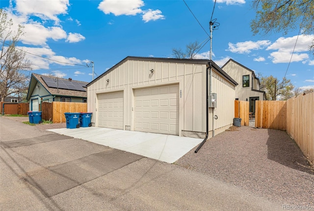 detached garage with fence