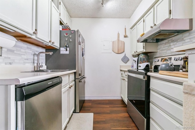 kitchen with dark hardwood / wood-style flooring, sink, a textured ceiling, appliances with stainless steel finishes, and white cabinets