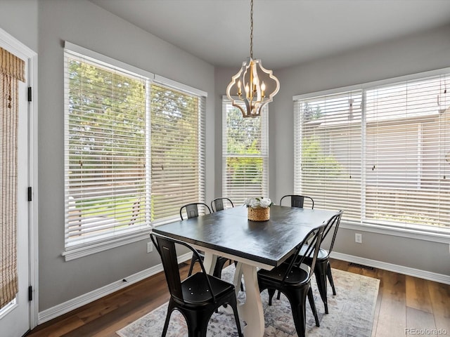 3043 W 109th Pl, Westminster, CO 80031 - dining space with a chandelier and wood finished floors