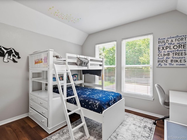 3043 W 109th Pl, Westminster, CO 80031 - bedroom with vaulted ceiling, dark wood-type flooring, and an office area
