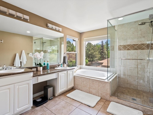 3043 W 109th Pl, Westminster, CO 80031 - full bathroom with a shower stall, tile patterned floors, double vanity, and a bath