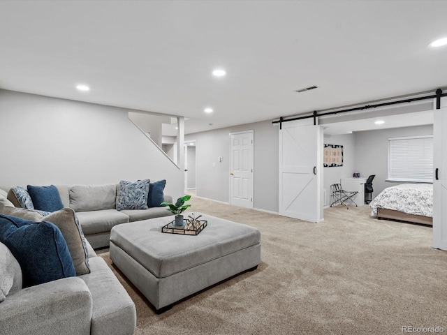 3043 W 109th Pl, Westminster, CO 80031 - carpeted living room featuring a barn door and recessed lighting