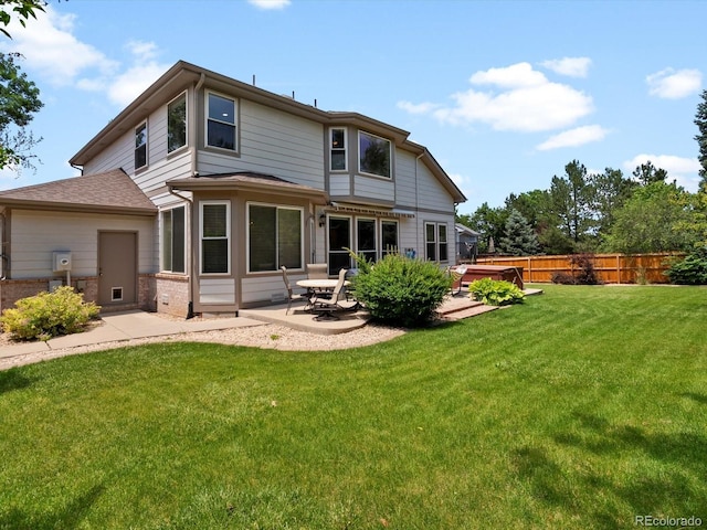 3043 W 109th Pl, Westminster, CO 80031 - rear view of house featuring a patio and brick siding