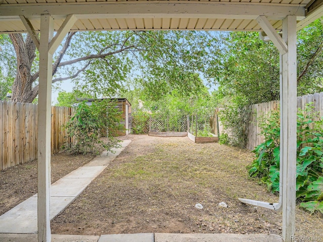 3304 W 3rd Ave, Denver, CO 80219 - fenced backyard featuring a storage shed