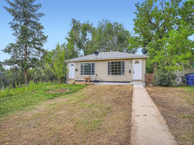 3304 W 3rd Ave, Denver, CO 80219 - view of front of home featuring entry steps and a front yard