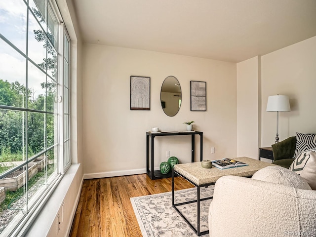 3304 W 3rd Ave, Denver, CO 80219 - living room featuring healthy amount of natural light and wood finished floors