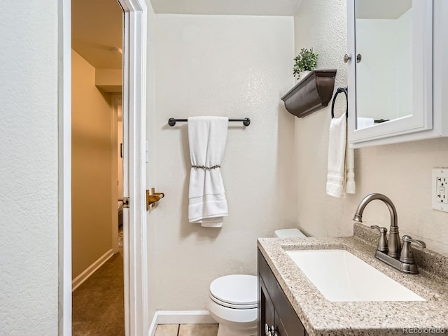 3304 W 3rd Ave, Denver, CO 80219 - bathroom featuring vanity and a textured wall