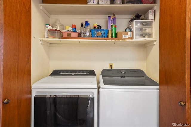 washroom with washer and clothes dryer