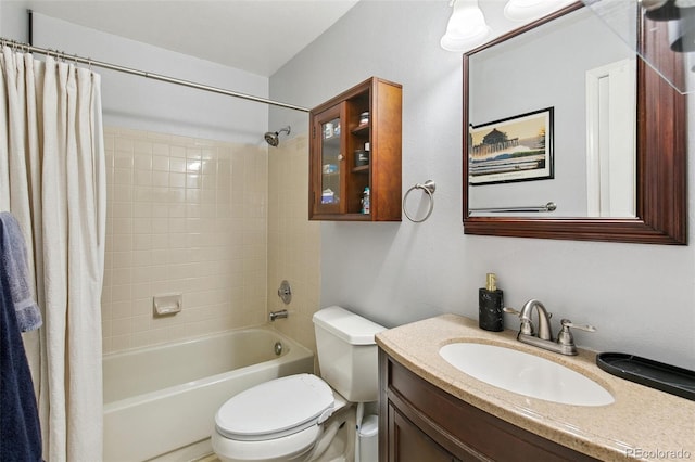 full bathroom with shower / tub combo, vanity, and toilet