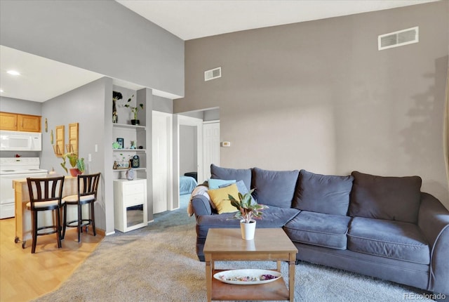 living room featuring light wood-type flooring