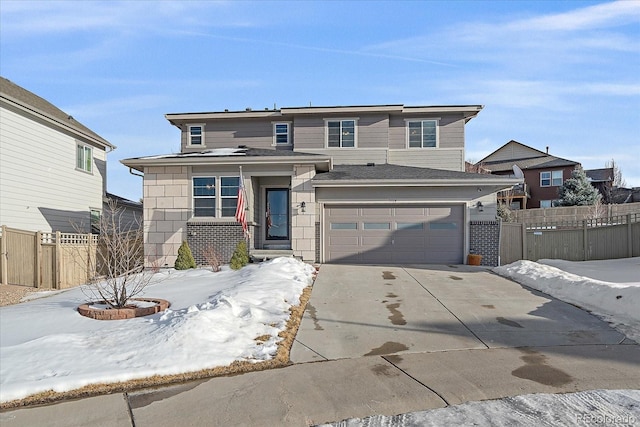 view of front of property with a garage