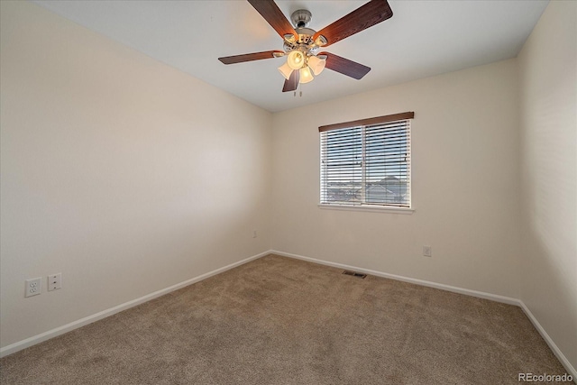 unfurnished room featuring carpet floors and ceiling fan