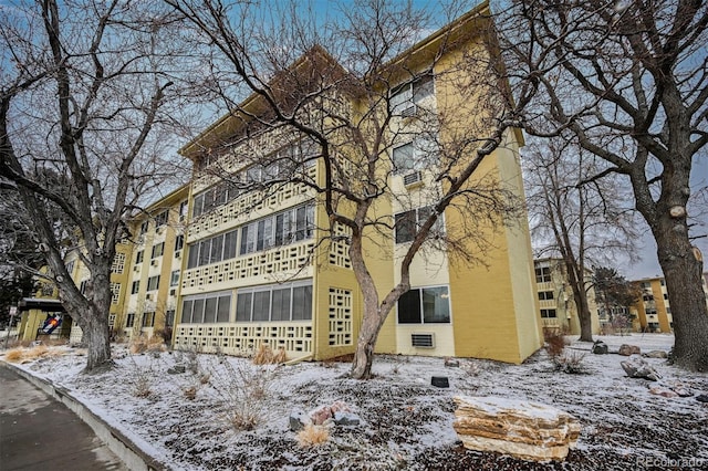 view of snow covered building