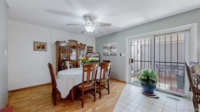 663 S Xenon Ct, Lakewood, CO 80228 - dining space with ceiling fan, a textured ceiling, and light wood-style floors