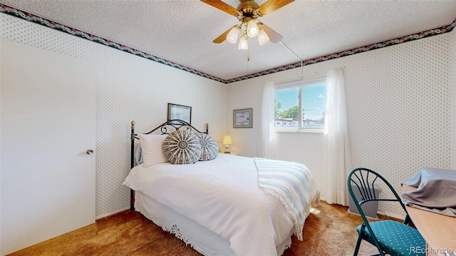 663 S Xenon Ct, Lakewood, CO 80228 - carpeted bedroom with a textured ceiling and ceiling fan