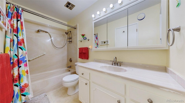 663 S Xenon Ct, Lakewood, CO 80228 - full bathroom with vanity, shower / bath combo with shower curtain, and tile patterned floors