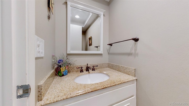 663 S Xenon Ct, Lakewood, CO 80228 - bathroom featuring vanity