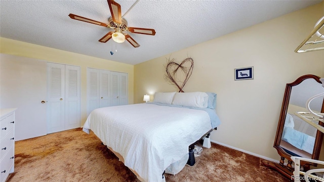 663 S Xenon Ct, Lakewood, CO 80228 - bedroom with light carpet, multiple closets, a ceiling fan, and a textured ceiling