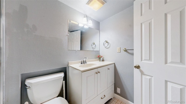 663 S Xenon Ct, Lakewood, CO 80228 - bathroom with vanity and toilet