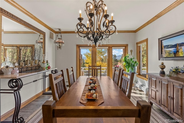 dining room featuring dark wood-style floors, french doors, crown molding, baseboard heating, and a chandelier