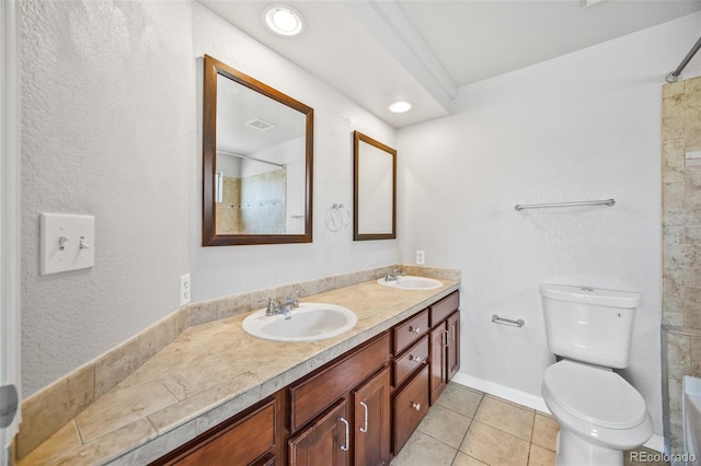 875 E 78th Ave Unit 9-2, Denver, CO 80229 - full bath featuring double vanity, tile patterned floors, and a shower