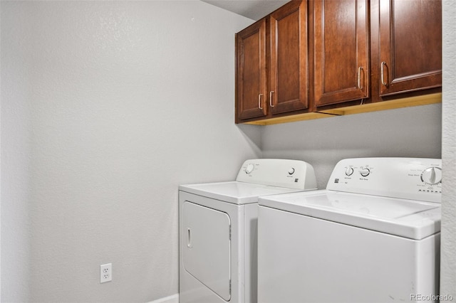875 E 78th Ave Unit 9-2, Denver, CO 80229 - laundry room with cabinet space and washer and dryer