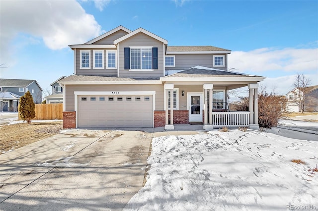 view of front of house with a garage and covered porch