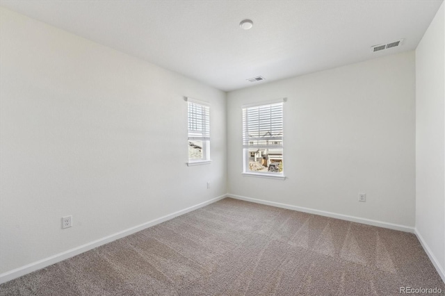 empty room with carpet floors